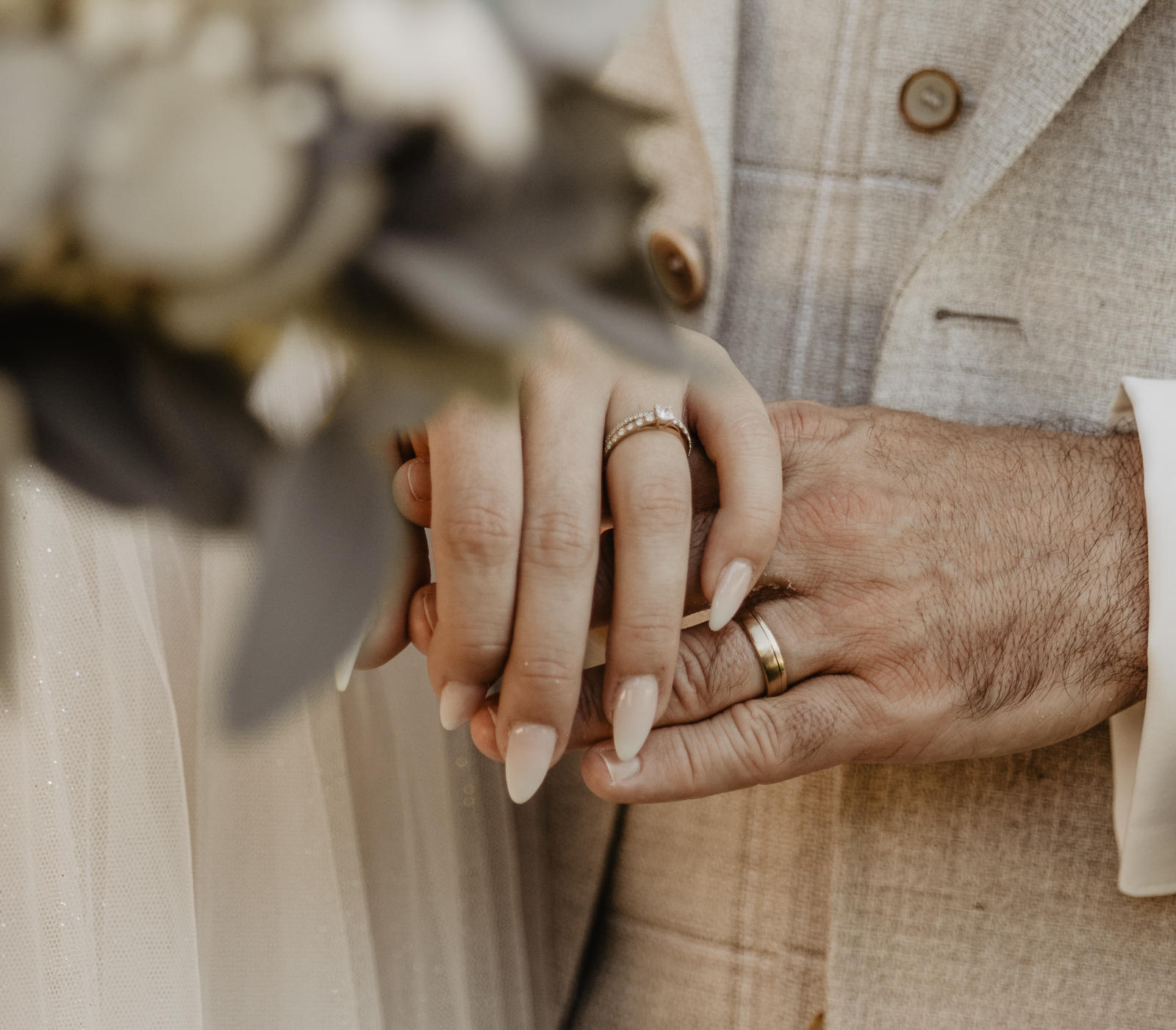 Hochzeitsfoto mit Ringen